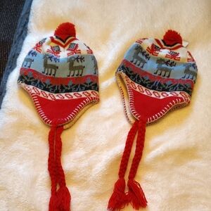 Festive Red and Blue Kids Hat with Reindeer Pattern